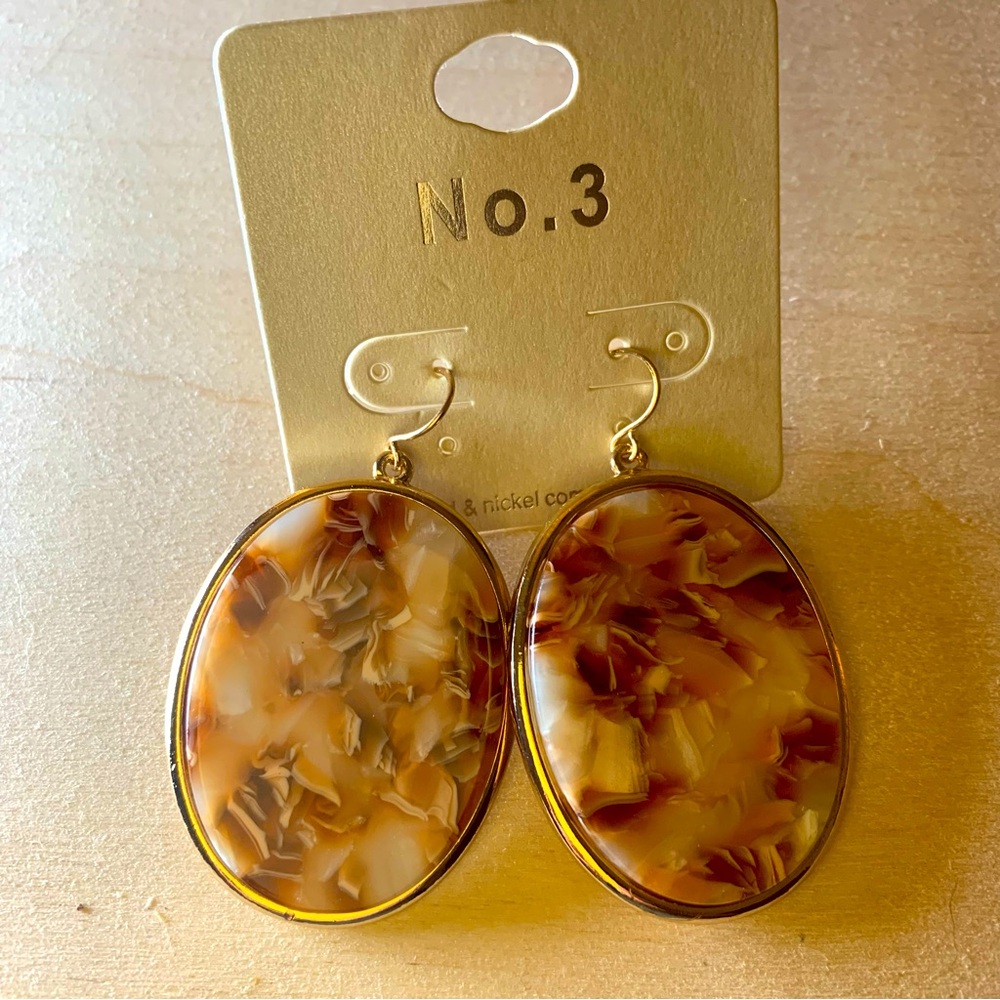 Brown and tan acetate earrings. Pair with cream top. Perfect for Fall!
